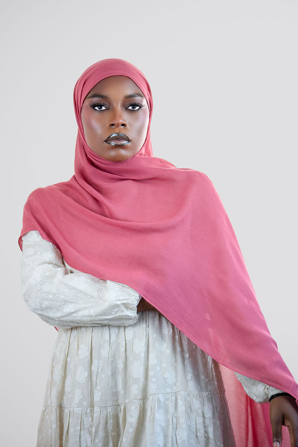 a women is wearing honeysuckle modal hijab at lave the label