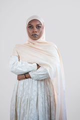 Woman wearing a beige hijab 